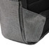 A grey computer backpack featuring a textured surface and a side pocket, with a logo on the front.