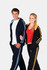A navy hoodie with blue stripes and an orange hoodie with yellow stripes, worn by a man and a woman.