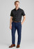 Men's comfort wool stretch slimline pant in navy blue, paired with a black shirt and brown belt. Features a logo.