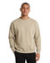 A grey poly cotton fleece jumper worn by a person, paired with a black beanie, featuring long sleeves.