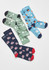 Unisex Happy Feet Comfort Socks in green with medical symbols, blue with animals, and navy with emergency vehicles.