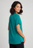 A woman wearing a teal plain tunic, showcasing a relaxed fit and short sleeves, with a back view visible.