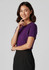 A woman models a purple short sleeve jersey top, paired with a black skirt. The top features a subtle logo.