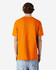 An orange heavyweight cotton unisex T-shirt displayed from the back, with a relaxed fit and short sleeves.