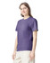 A purple adult heavyweight T-shirt displayed on a model, featuring a crew neck and short sleeves.