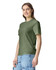 A green adult heavyweight T-shirt is featured, displayed on a model with a neutral expression and casual attire.