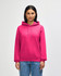 A pink Gildan Heavy Blend adult hooded sweatshirt with a front pocket and a hood. The model stands in a neutral background.