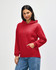 A red Gildan Heavy Blend adult hooded sweatshirt with a front pocket and a hood. It features a brand logo.