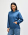 A blue hooded sweatshirt with a front pocket and a drawstring hood, worn by a model.