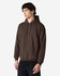 A brown hooded sweatshirt with a kangaroo pocket and a logo. The model is standing against a plain white background.