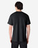 A black Gildan Ultra Cotton adult t-shirt shown from the back, featuring short sleeves.