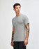 A grey unisex short sleeve t-shirt is displayed, featuring a simple design and a logo.