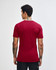 A unisex short sleeve t-shirt in red with a plain back view and a logo on the tag.