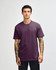 A unisex short sleeve T-shirt in a deep purple colour, featuring a relaxed fit and a visible logo.