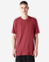 A unisex CVC short sleeve T-shirt in a rich burgundy colour, displayed on a model. Features a logo.