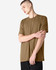 A unisex short sleeve t-shirt in a muted brown colour, displayed on a model. Features a logo.