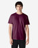 A maroon Gildan Heavy Cotton Adult T-Shirt on a model, featuring short sleeves and a round neck, with a logo.