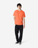 An orange Gildan Heavy Cotton Adult T-Shirt displayed on a male model, paired with black jeans and shoes.
