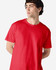 A plain red Gildan Heavy Cotton Adult T-Shirt displayed on a model, featuring a logo on the shirt.