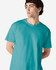 A turquoise Gildan Heavy Cotton Adult T-Shirt on a model, featuring a simple design and a logo.