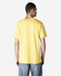 A plain yellow Gildan Heavy Cotton adult T-shirt viewed from the back, featuring a casual fit.