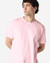 A light pink Gildan Heavy Cotton adult T-shirt with a crew neckline and a fitted style. It features a logo.