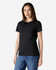 A black Gildan Heavy Cotton ladies' T-shirt displayed on a model. The product features a classic crew neck design.