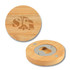 A drink bottle opener coaster made of bamboo with a circular design and a metallic bottle opener inset.