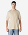 A beige adult t-shirt is displayed worn by a male model, featuring a simple design and short sleeves.