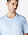 A light blue Gildan Softstyle adult t-shirt featuring short sleeves and a round neckline, modelled by a male.