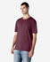 A maroon adult T-shirt displayed on a model, featuring a relaxed fit and short sleeves. Logo present.