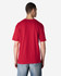 A red Gildan Softstyle adult T-shirt displayed from the back, worn by a model in denim jeans.