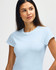 A blue ladies' T-shirt made from soft fabric, featuring a crew neck and short sleeves, with a logo.