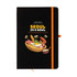 A black A5 notebook with an illustrated cover featuring food items and a logo. It has an orange elastic band.