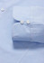 A light blue women's luxe long sleeve button-up shirt featuring a double cuff design and buttons.