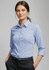 Light blue women's button-up shirt with 3/4 sleeves and a collar, featuring a logo.
