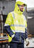 A waterproof jacket in high visibility yellow and navy, featuring reflective strips and a hood. It has a logo.