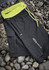 A pair of black sports shorts with a neon yellow waistband and drawstring, featuring a logo.