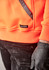 An orange water-resistant hoodie with a logo and a diagonal black detail, paired with black pants and gloved hands.