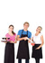 Three individuals wearing black long waist aprons, displaying drinks and a dish. The setting is casual and cheerful.