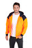 A man wearing an orange and navy blue zippered hoodie with a logo, designed for workwear use.