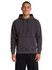 A dark stone wash fleece hoodie with a front pouch pocket and a drawstring hood, worn by a smiling model.