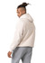 A light beige men's cotton hoodie with a kangaroo pocket, worn with grey sweatpants, featuring a logo on the front.