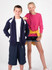 A navy jacket with white contrast details worn by a boy, alongside a girl in a pink top and denim shorts.