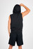 A sleeveless black zip hoodie with a hood, displayed from the back, paired with matching black shorts.