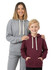 A woman in a grey heavy fleece hoodie stands beside a boy in a maroon hoodie. Both hoodies have drawstrings and pockets.