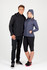 A black soft shell hooded jacket on a male model and a navy soft shell hooded jacket on a female model, both with logos.