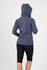 A soft shell hooded jacket in grey, featuring a fitted design and a back view. The model wears black leggings.