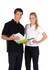 A man in a black polo shirt and a woman in a white polo shirt stand together, holding a folder. Both shirts feature contrasting piping.