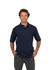 A men's cotton pique knit polo in navy blue, featuring a collar and short sleeves, modelled by a smiling man.